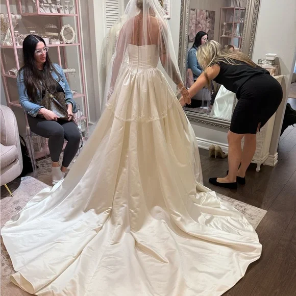 Elegant White Satin Strapless Wedding Ball Gown - Picture 2 of 3